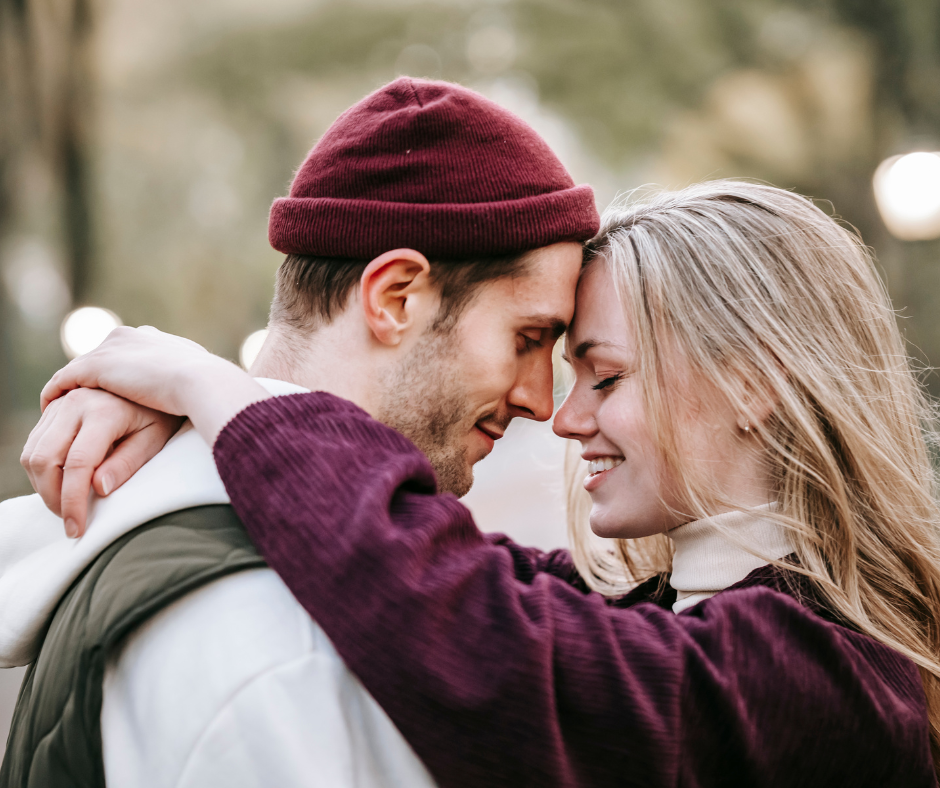 A couple hugging during their engagement session in nyc.