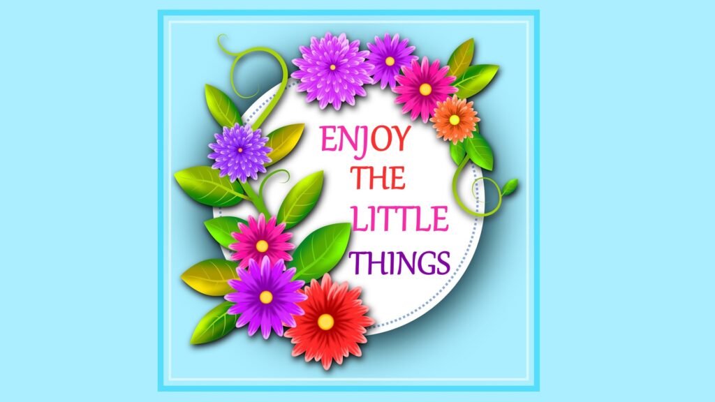 Inspirational quote "enjoy the little things" surrounded by a decorative frame of colorful paper flowers and leaves on a blue background.